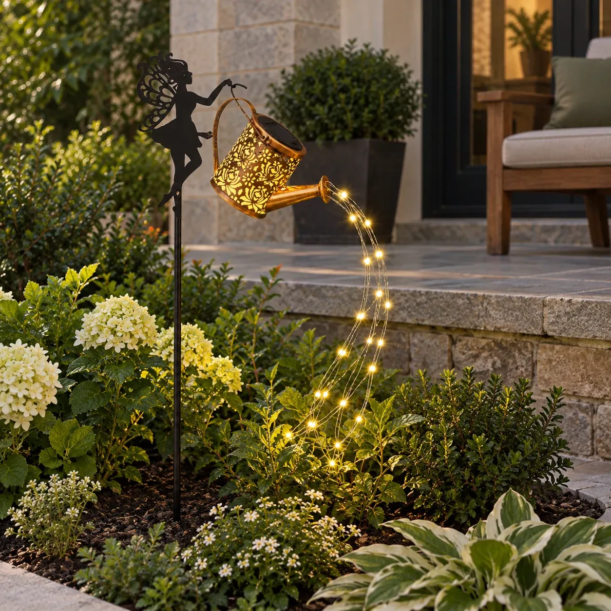Aveline Watering Can Light - Warm white with fairy hook - in a furnished setting; other objects not included